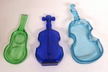 A Trio Of Violin Shaped Glass Bottle & Ashtrays In Bright Colors