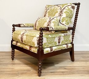 An Elegant Turned Wood Arm Chair In Morris Style Print By Bassett Furniture