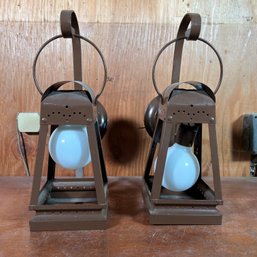 A Pair Of Brown Carriage Lantern Sconces