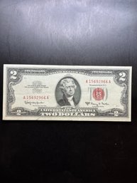 1963-A Red Seal $2 Bill AU CONDITION