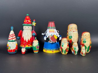 A Selection Of Holiday Nesting Dolls & A Candle Holder, Santa Themed