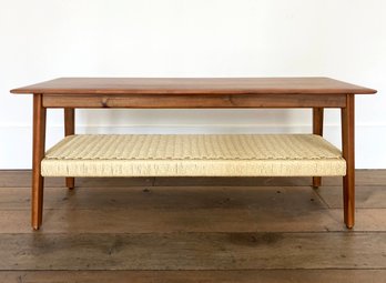 A Modern Wood Coffee Table With Woven Shelf By Williams Sonoma Home