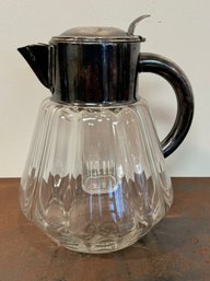 A Vintage Glass Beverage Pitcher With Silver Plated Top - Ice Holder