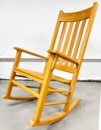 A Vintage Slatted Oak Rocking Chair