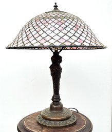 A Vintage Bronze And Stained Glass Table Lamp In Tiffany Style