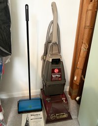 A Hoover Steam Vac And Manual Vacuum