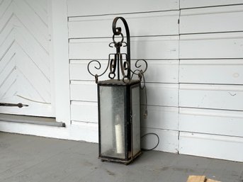 A Rustic Exterior Lantern In Wrought Iron With Seeded Glass, Vintage