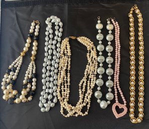 Six Faux Pearl Necklaces