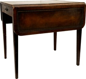 A Vintage Mahogany Pembroke Table With Tooled Leather Top