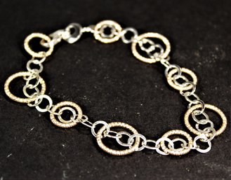 Sterling Silver Having Gold Wash Ring Formed Bracelet