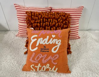 Four Orange Pillows Including Kate Spade & Calvin Klein