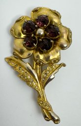 VINTAGE GOLD TONE PURPLE RHINESTONE FLOWER BROOCH