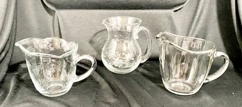 Trio Of Clear Glass And Crystal Creamers