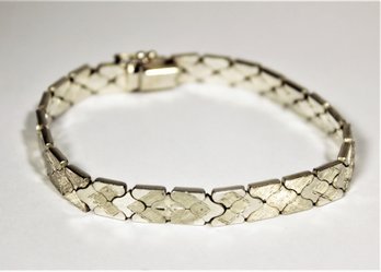 Fine Sterling Silver Link Bracelet Having Bright Cut Design