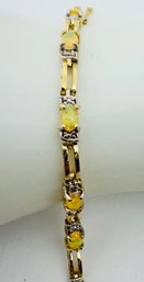 SIGNED FAS GOLD OVER STERLING SILVER YELLOW OPAL AND DIAMOND ACCENT BRACELET