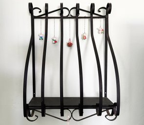A Vintage Wrought Iron Cutting Board Rack