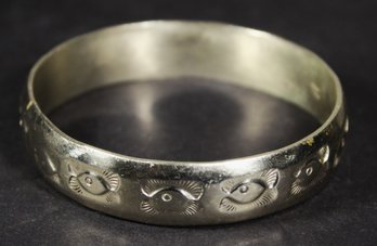 Signed Heavy Silver Tone Bangle Bracelet Having Stamped Design