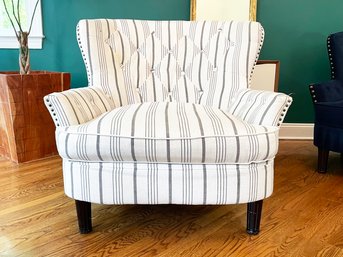 An Elegant Modern Armchair In Striped Canvas With Nailhead Trim