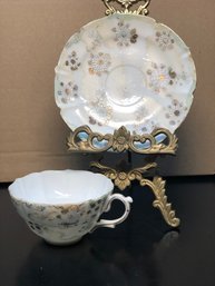 No Makers Mark/raised Flowers Tea Cup And Saucer