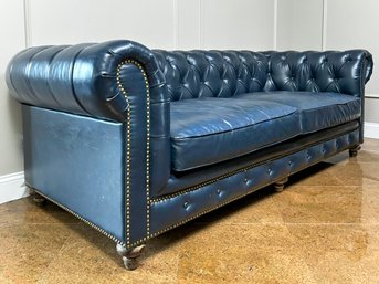 An Elegant And Glamorous Vintage Chesterfield Sofa With Nailhead Trim In Deep Blue, Likely Arhaus