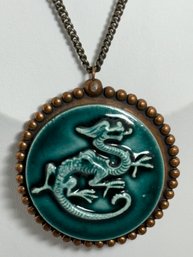 COPPER TONE AND BLUE PORCELAIN DRAGON PENDANT