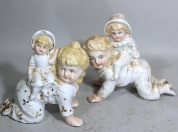 Pair Antique German Porcelain Piano Babies With Riders
