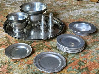 A Collection Of Pewter Serving Ware