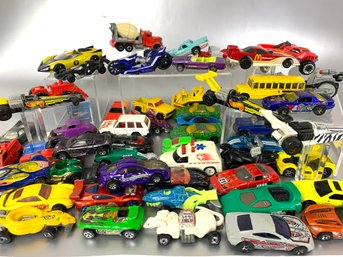 A Group Of Over 50 Hot Wheels Die Cast Vehicles