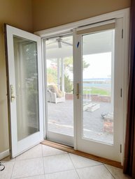 A Set Of Andersen Thermopane French Doors - X2 - TV Room