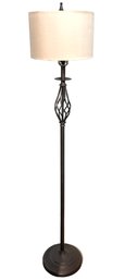 A Floor Lamp In Oil Rubbed Bronze Finish