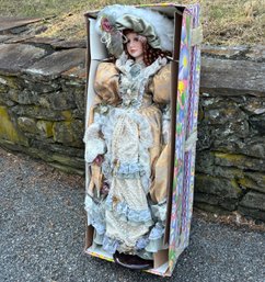 A Large Porcelain Doll From The Cathay Collection