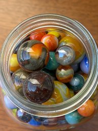 Large Glass Jar Of Marbles