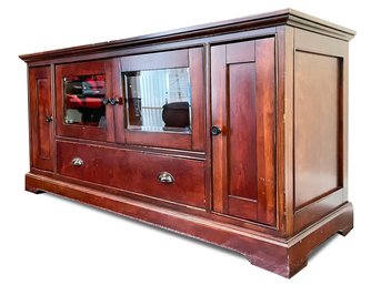 A Solid Paneled Mahogany Entertainment Console