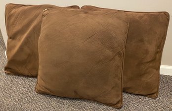 Three Brown Throw Pillows