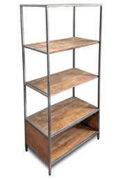 An Industrial Style Metal And Wood Shelf