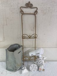 Towel Rack In Gold And A  ConAir Mini Pro Hair Dryer