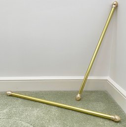A Pair Of Brass Curtain Rods
