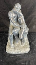 Couples Embracing Sculpture