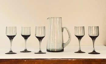 Five Smokey Gray 4' Glasses With Small Pitcher