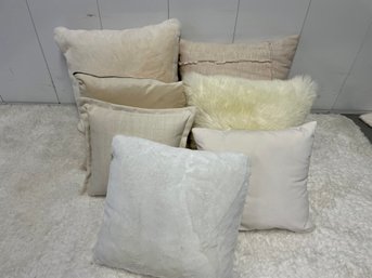 Seven Vanilla & Snowy White Throw Pillows Including Faux Fur