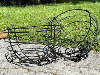 A Pair Of Modern Coiled Wrought Iron Hanging Baskets