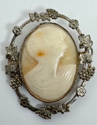 VINTAGE SILVER TONE FLORAL FRAMED CARVED SHELL CAMEO BROOCH