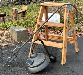 A Solar LED Barn Sconce And A Small Step Ladder