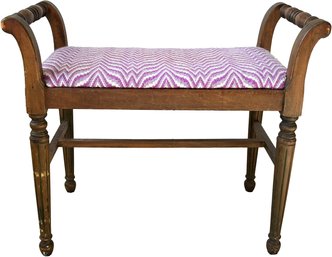 A Vintage Carved Wood Bench With Modern Upholstery