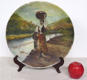 A Large Handpainted Milk Glass Plate Artist Signed Depicting A Woman Carrying Water - Signed A. Davise