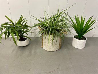 Three Faux Plants In Decorative Pots Including Handled Basket Planter
