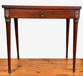 A 19th Century Mahogany Writing Desk With Tooled Leather Top And Ormolu Trim