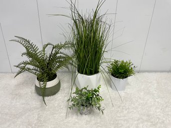 Four Faux Plants In Attractive Pots Including Tall Grasses
