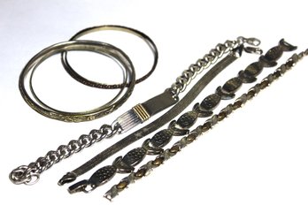 Lot 7 Silver Tone Link And Bangle Bracelets