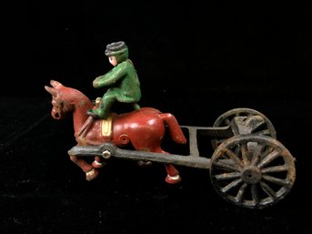 Vintage Metal Man With Horse Drawn Carriage